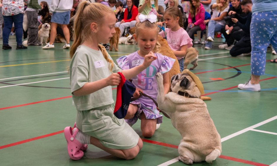 Georgia and Erin with Arthur the Pug at the Dog Show competition