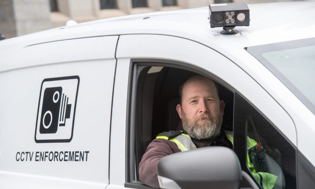 City warden Scott Thomson in one of Aberdeen City Council's new ANPR parking camera vans. Image: Kami Thomson/DC Thomson