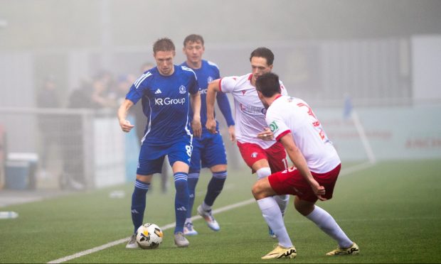 Cove's Blair Yule in action against Spartans in the Premier Sports Cup. Image: Kami Thomson/DC Thomson.