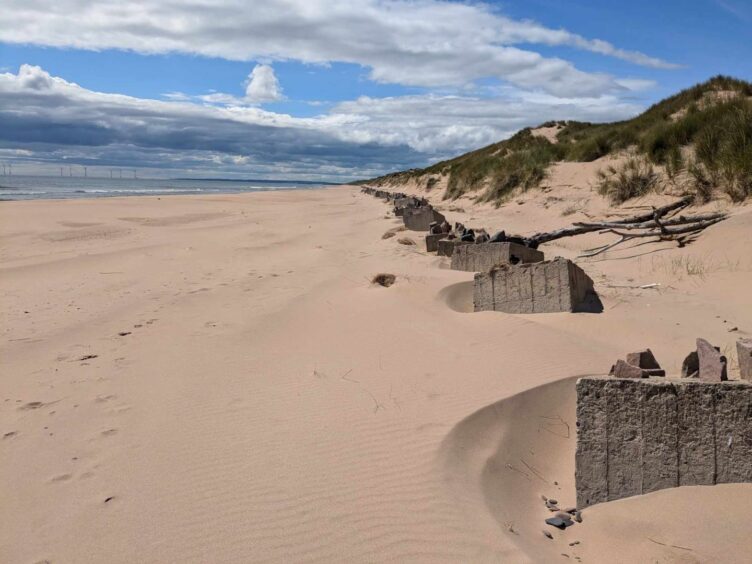 A line of anti-tank blocks on Newburgh beach. Image: Gayle Ritchie.