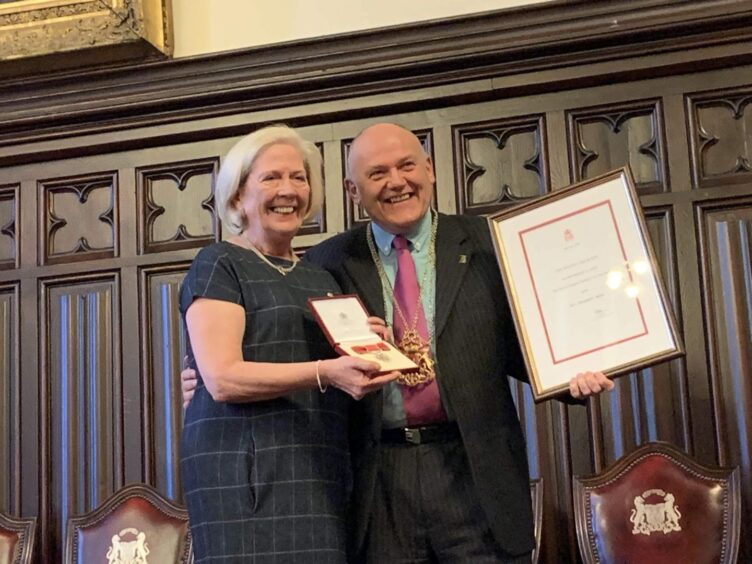 Liz Milne with the Lord Provost at the time Barney Crockett. 