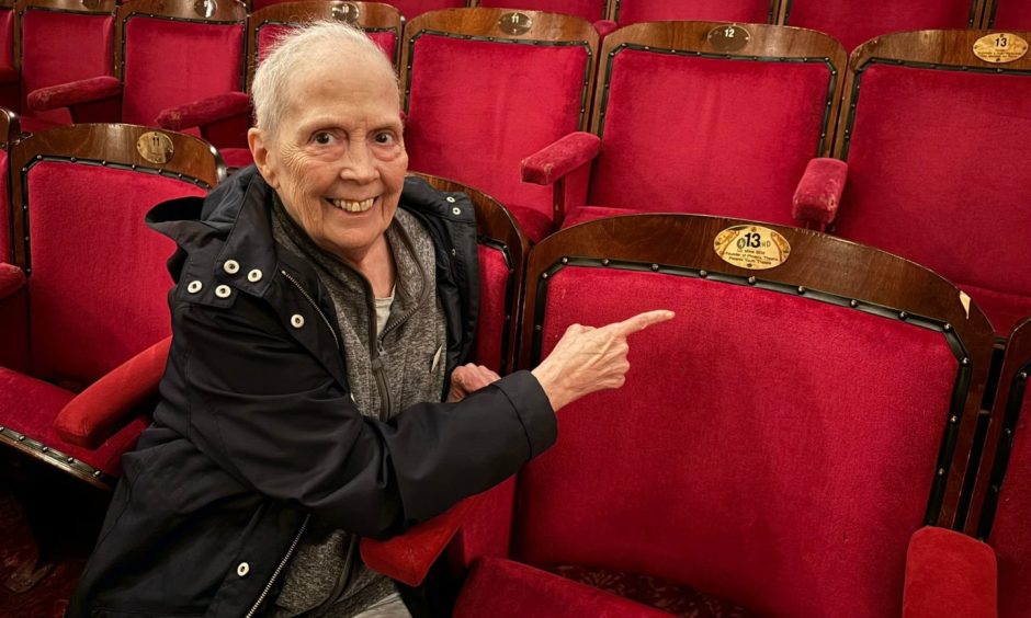 Liz Milne with her plaque at HMT.