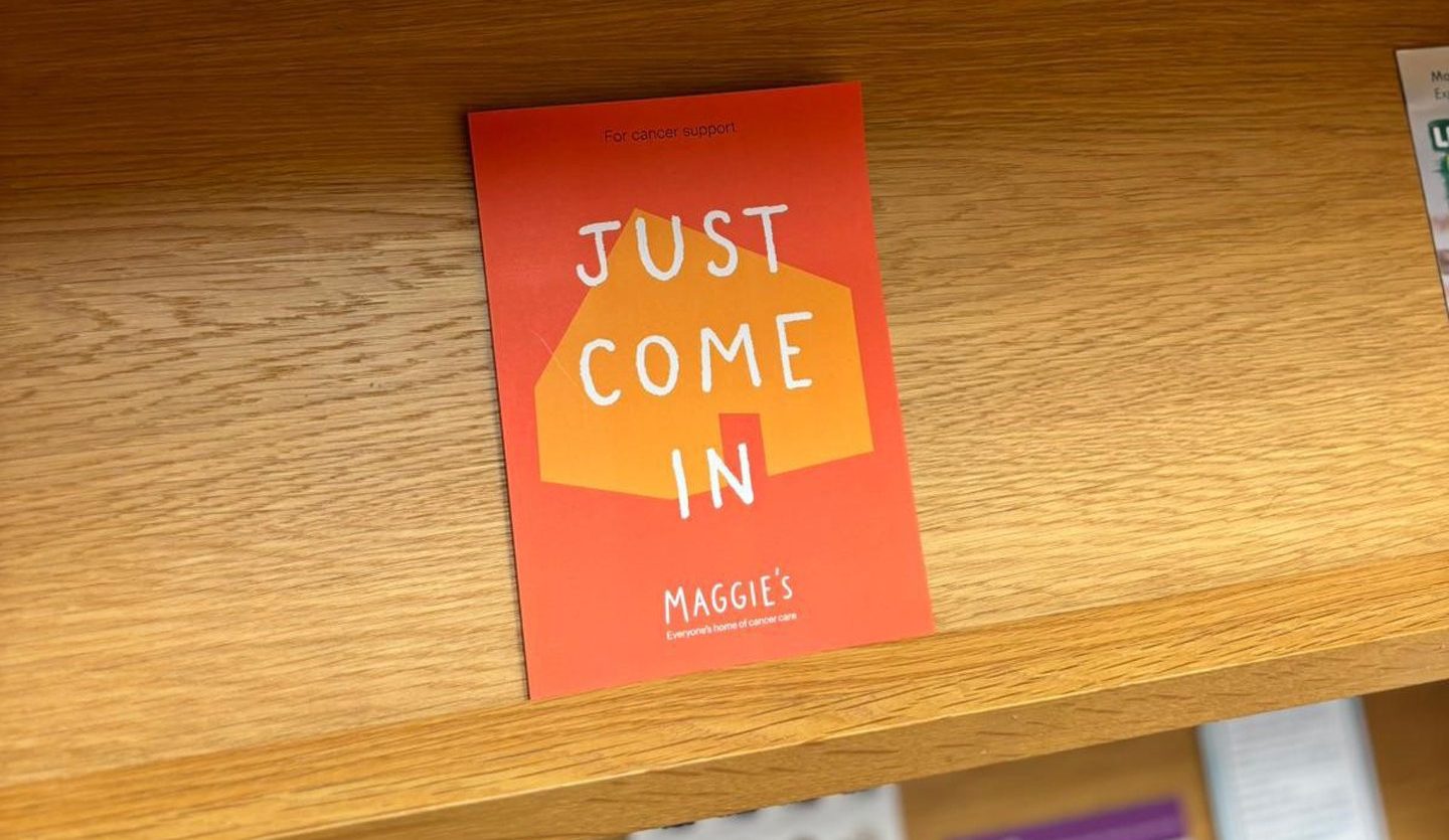 A leaflet for the centre reading "just come in"