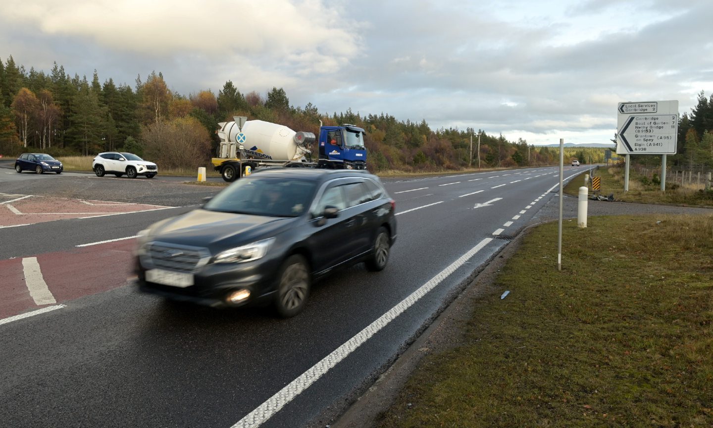 Traffic travelling past the Blackmount junction at Carrbridge.