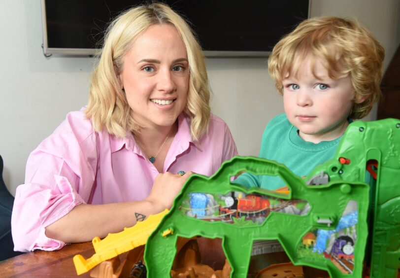 Skye Jolly, childminder, with a little boy