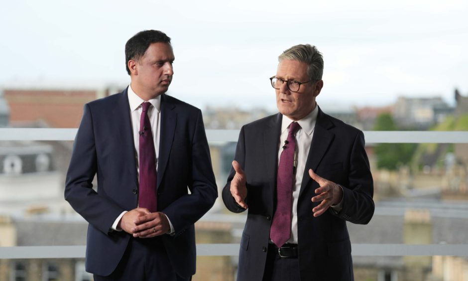 Prime Minister Sir Keir Starmer and Scottish Labour leader Anas Sarwar during an event in Edinburgh. 