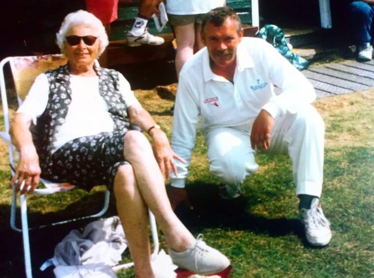 Stephen Brady with his mother, Jean, at a cricket match in Balmoral.