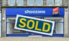 Former Elgin Shoezone home sold and set for new life.