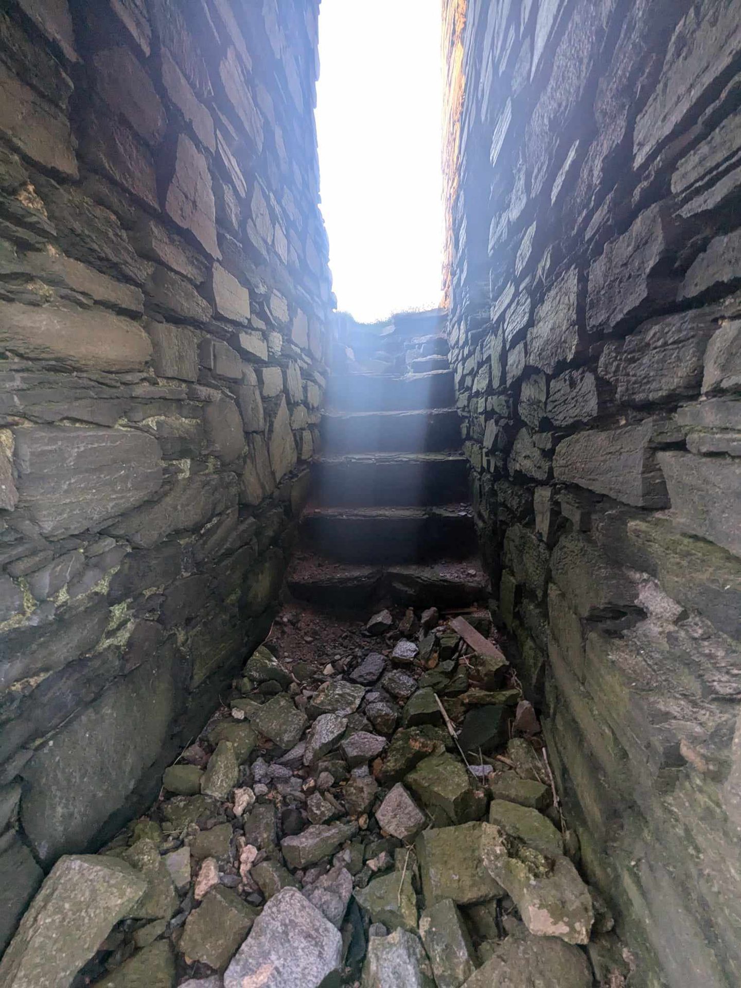 A crumbling staircase inside the ruins of Old Slains Castle. 