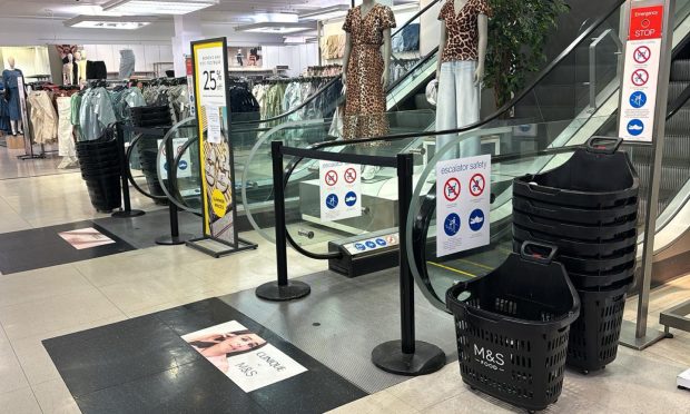 Customers are prevented from going up the escalators. Image: Supplied.