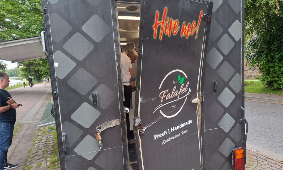 Door of Inverness food truck The Falafel Shop damaged during the theft.