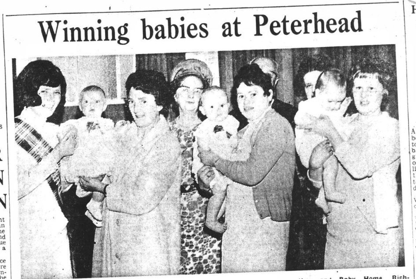 A clipping from a newspaper with the headline 'Winning babies at Peterhead' with a photograph of mothers holding their babies