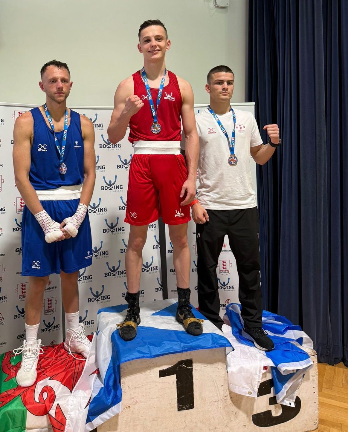 T Byron Boxing's Sonny Kerr (centre) tops the podium after winning the British title Image supplied by Byron Boxing