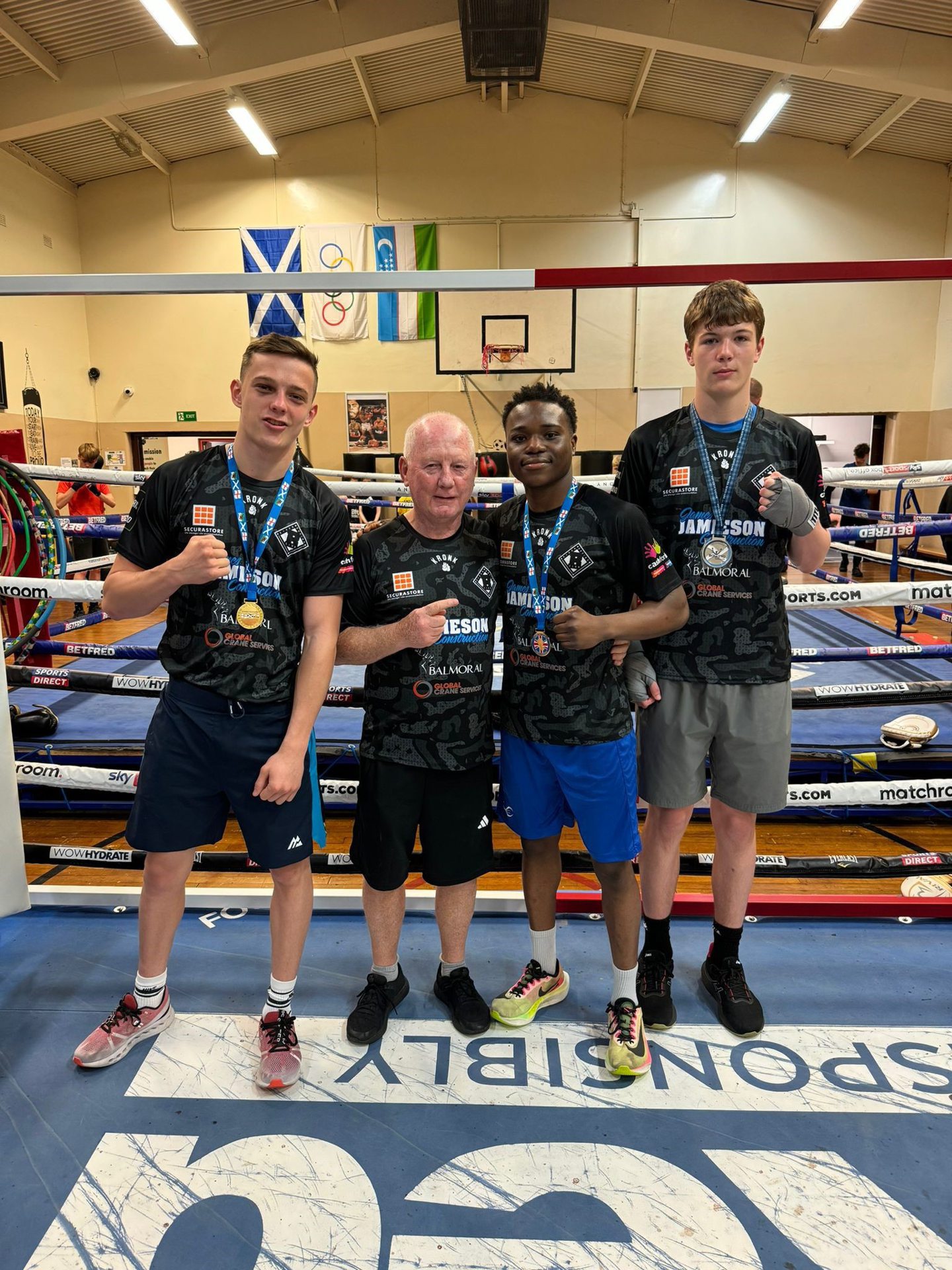  Byron Boxing Club fighters win British titles - left to right - Sonny Kerr, Tony Kerr (coach), Fawaz Aborode, Mikey Kahl Image supplied by Byron Boxing 