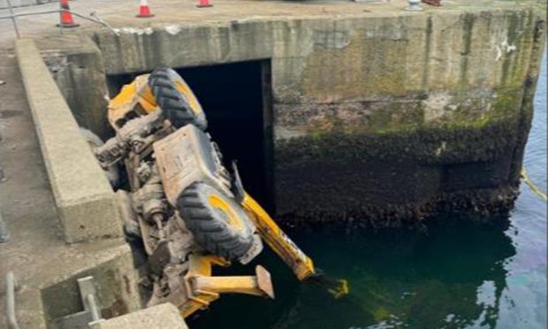 The vehicle fell into the town's harbour.