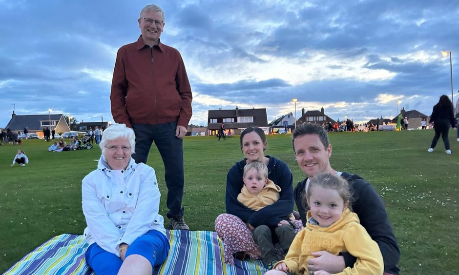 The Massie family were one of many who loved The Firebirds first appearance at Peterhead Scottish Week. Image: Isaac Buchan/ DC Thomson