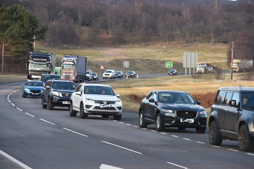 Line of traffic congestion on the A9 heading south towards Kingussie.