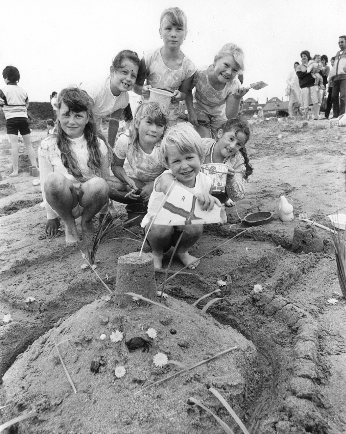 young girls taking part in the sandcastle competition