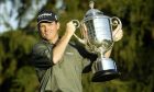 Shaun Micheel holds up the Wanamaker Trophy After Winning the 85th PGA Championship at Oak Hill Country Club in 2003. Image: Shutterstock.