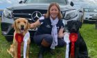 Prize-winning doggie duo Lacey and Parker, with their owner, Katrina Byrne.