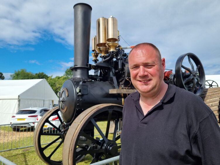 Cameron Anderson, co-owner of Subsea Tooling, Oldmeldrum with his steam traction engine Erebus. 