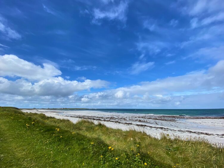 A landscape of sea, shore and beach in South Uist.