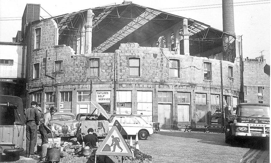 The demolition men move in at the New Market in 1971. Image: DC Thomson