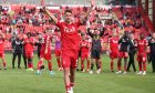 An emotional Bojan Miovski of Aberdeen waves goodbye to the Aberdeen fans after the 3-1 defeat of St Mirren. Image: Shutterstock