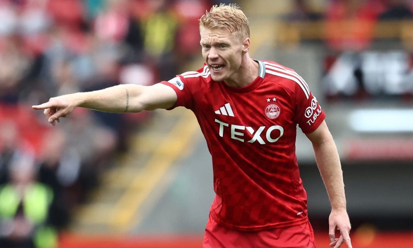 Sivert Heltne Nilsen of Aberdeen directing hi team-mates.