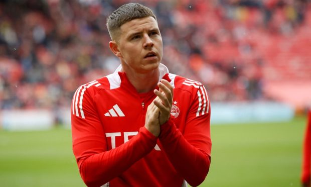 Kevin Nisbet of Aberdeen applauds fans after his debut in the 2-0 defeat of Kilmarnock. Image: Shutterstock