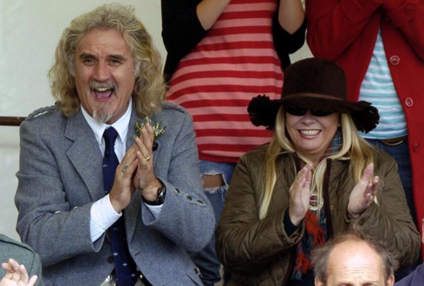 Comedian Billy Connolly and wife Pamela Stephenson enjoy the Lonach Highland Gathering