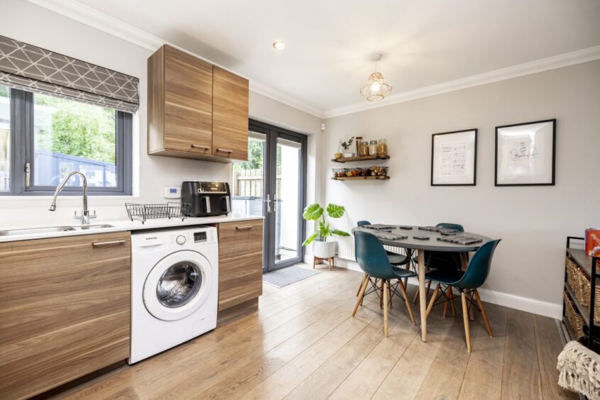 Kitchen at 21 Waterton Lawn, featuring French doors out to back garden.