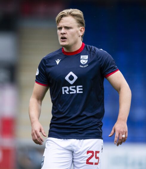 Ross County striker Alex Samuel is shown in action, waiting for a pass from his team-mates. 