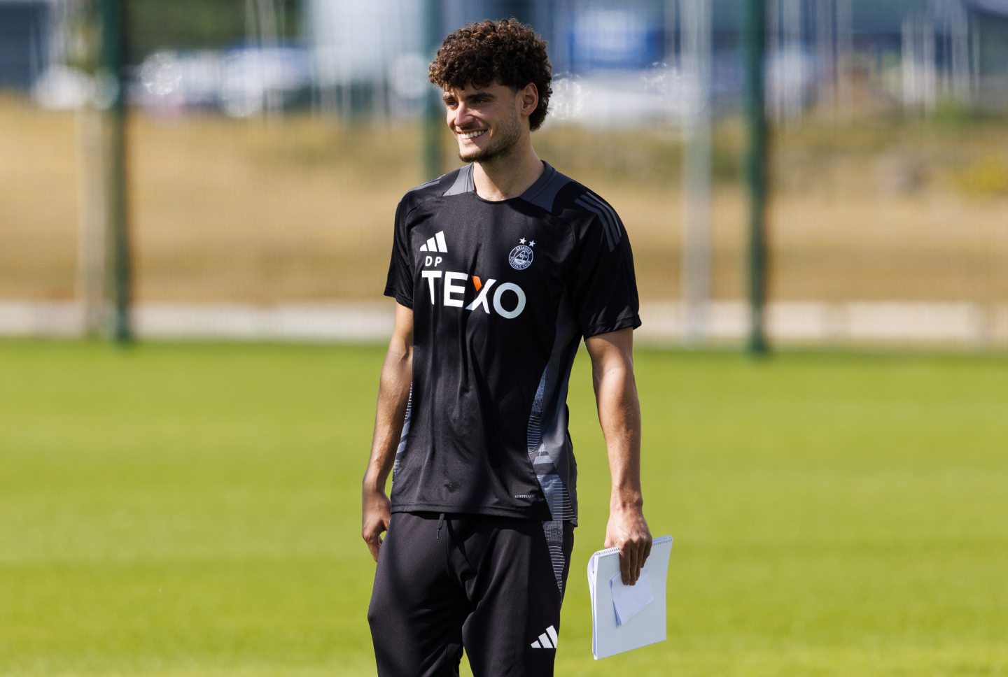 Aberdeen midfielder Dante Polvara holds his set-piece details during training session at Cormack Park. Image: SNS