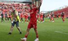 Aberdeen's Bojan Miovski tearfully says goodbye to the fans after the 3=1 defeat of St Mirren. Image: SNS