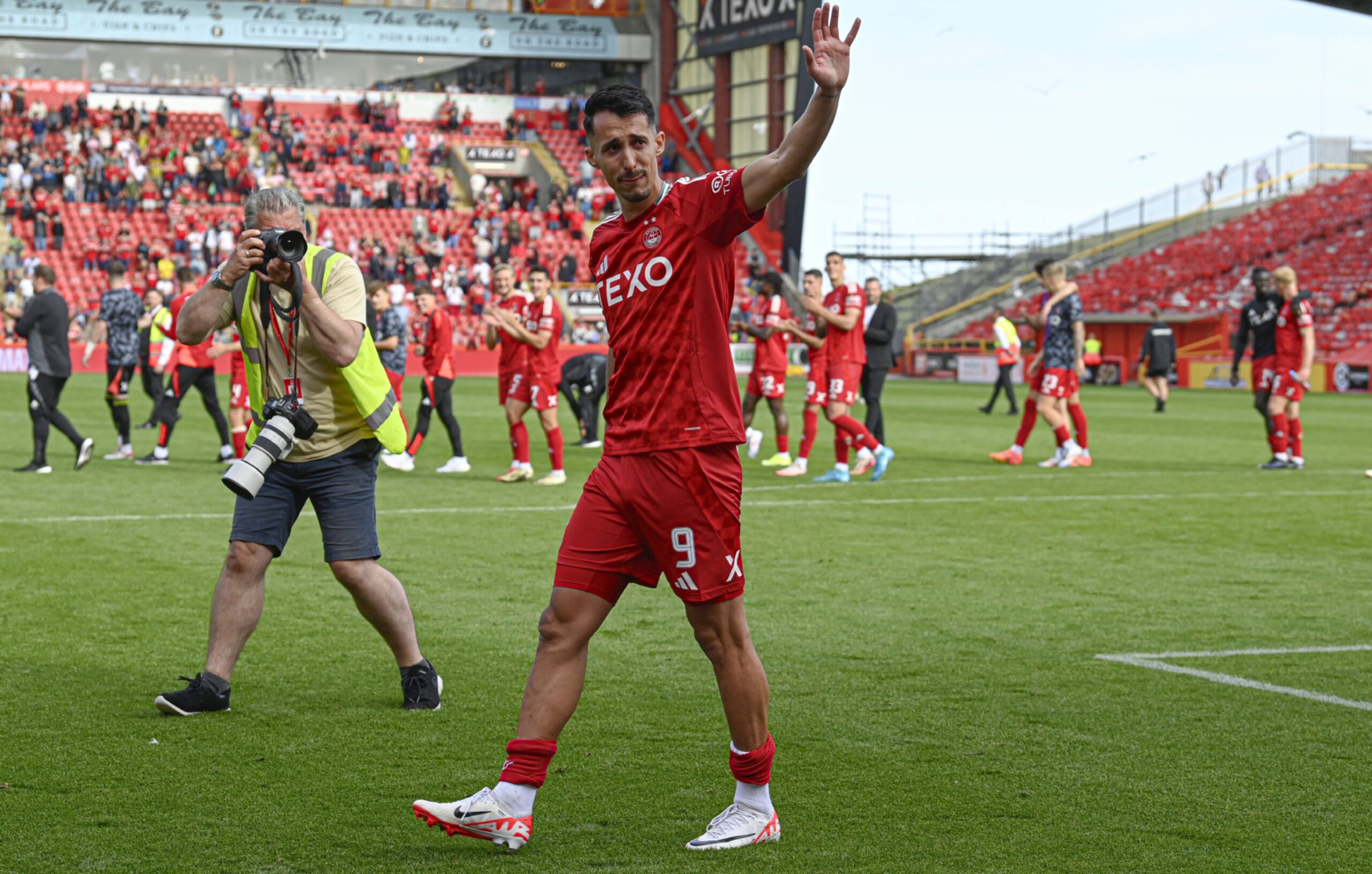 Aberdeen's Bojan Miovski tearfully waving to the crowd