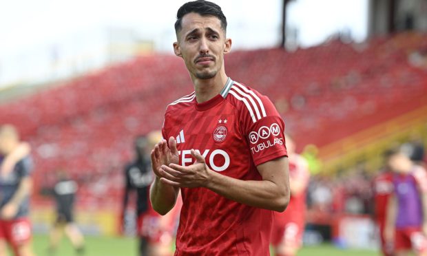 Aberdeen's Bojan Miovski tearfully says goodbye to the Dons fans after the St Mirren game. Image: SNS.