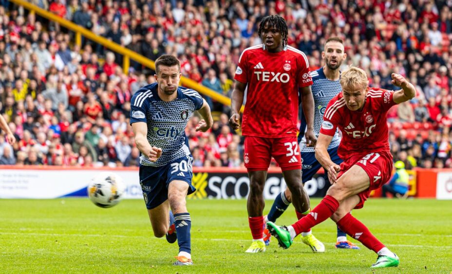 Aberdeen's Topi Keskinen scores the winner in the 1-0 defeat of Queen's Park. Image; SNS