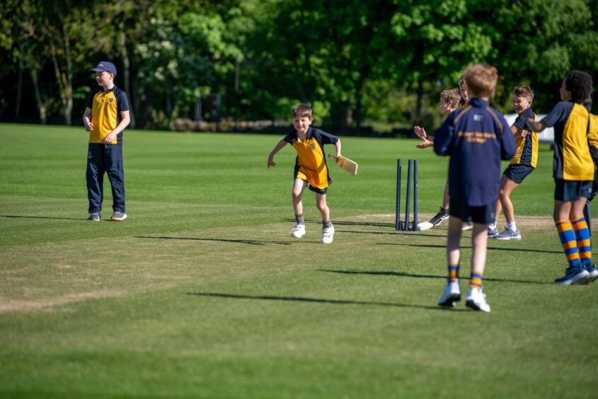 Children at RGC playing cricket