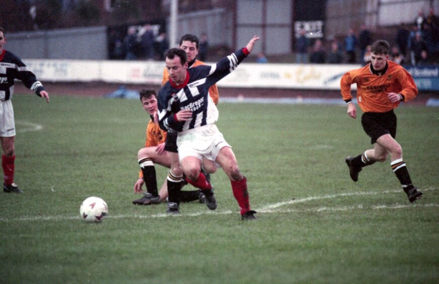 Gordon Connelly in action for Ross County in a Scottish Cup tie against Alloa Athletic in 1995. Image: DC Thomson.