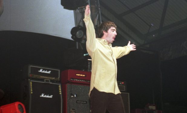 Michael McGunnigle, 20, a grocery supervisor with RS McColl, Bridge of Don, is cheered by the store’s newsboys after his nine-hour disco in Morecambe raised £127 for the appeal.