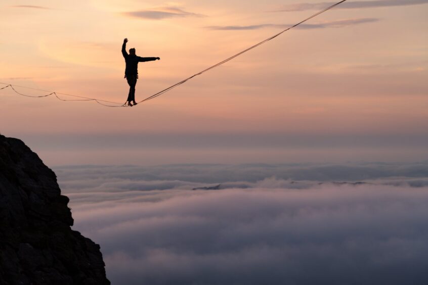 Owen Hope highlining at An Teallach in Wester Ross.