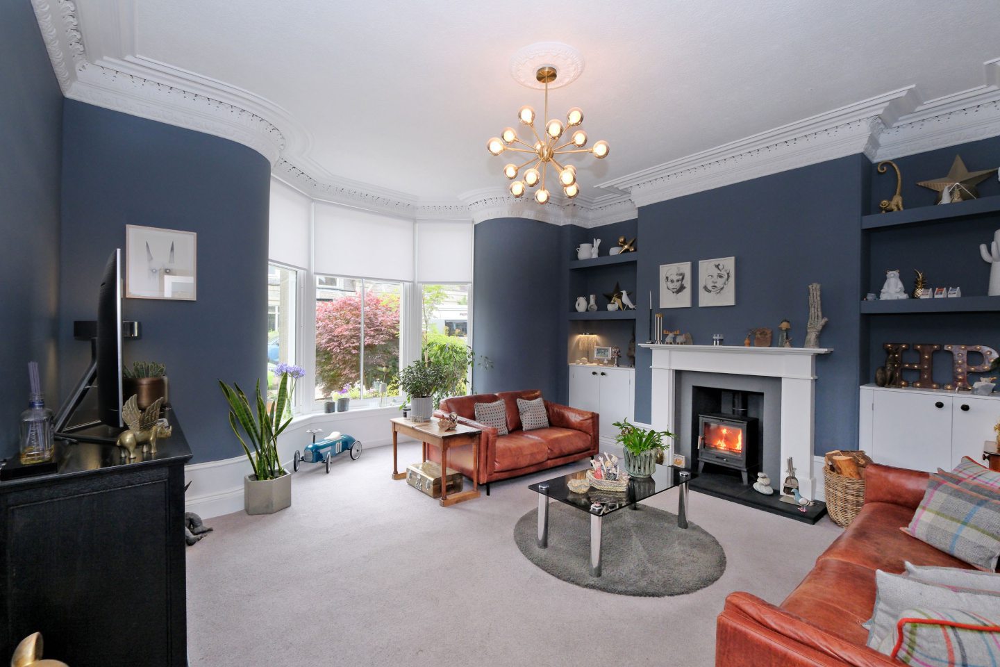 Spacious living area at the Rosemount home renovation, featuring high ceilings and stylish cornicing.