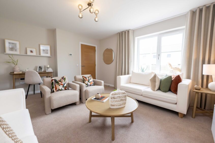 living room in a home in CHAP Homes' luxury Crest of Lochter development