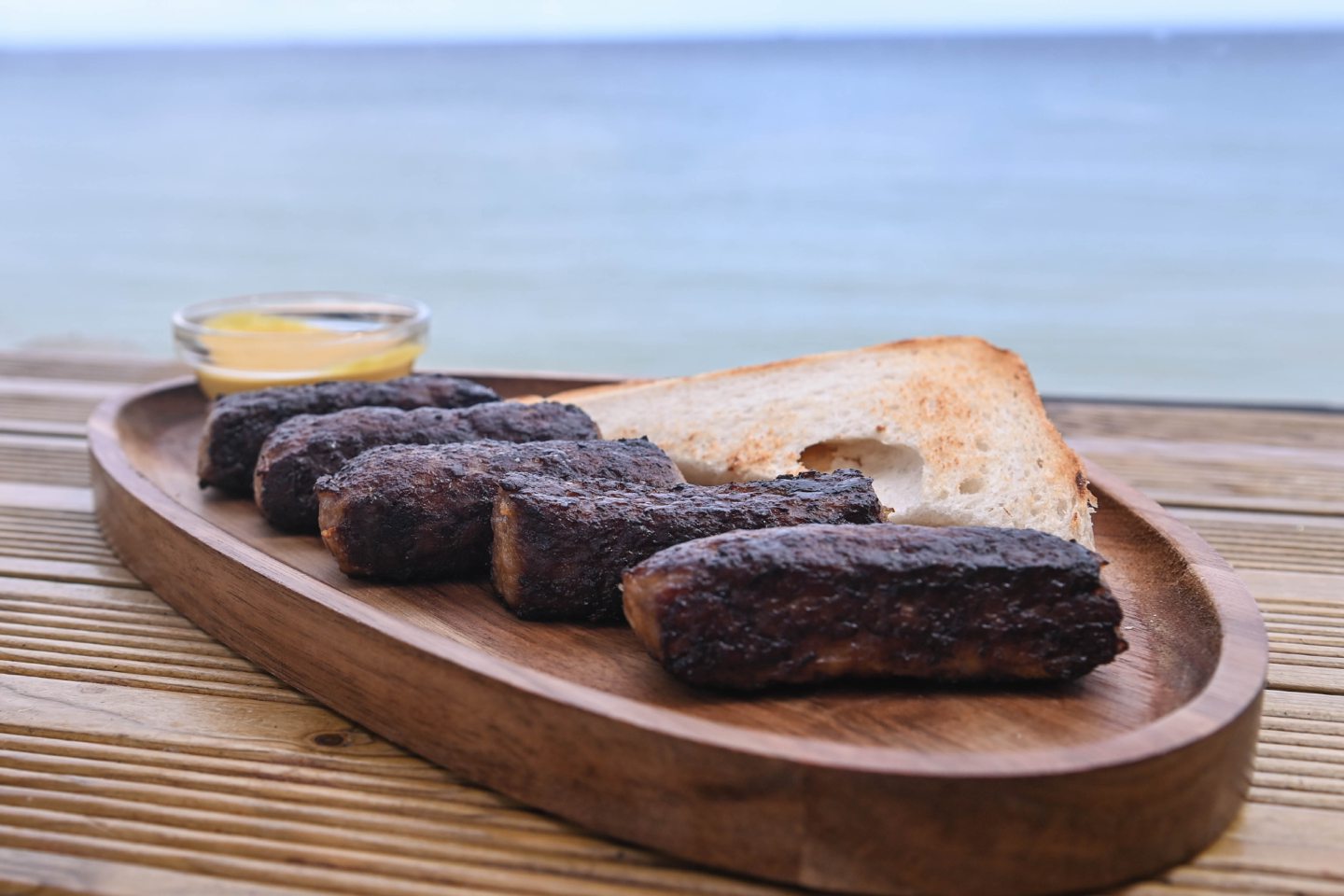 Mici dish at The Highlander Bus Cafe on Aberdeen beach.