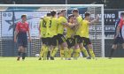 Nairn's Andrew Greig celebrating after scoring to make it 2-0 against Turriff. Image: Darrell Benns/DC Thomson.