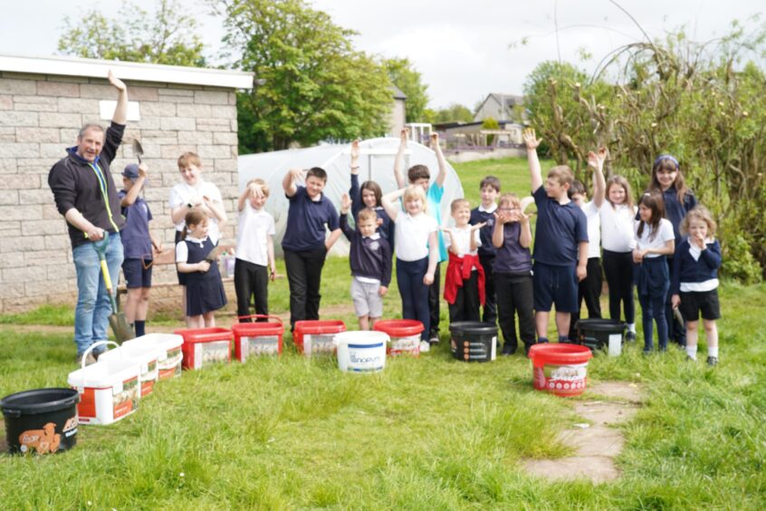 Monquhitter Primary School pupils got their hands dirty planting potatoes for Turriff Show.