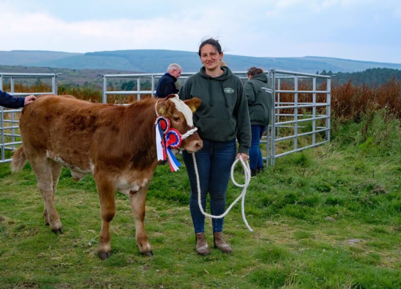 Catherine Anne MacDonald won the overall cattle champion's prize with her young stot calf.