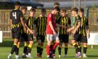 Alfie Stewart celebrates his free-kick opener for Aberdeen over Deveronvale. Image: Jasperimage.