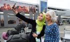 Lorna Norgrove meets one of the students from Afghanistan. Image: PA